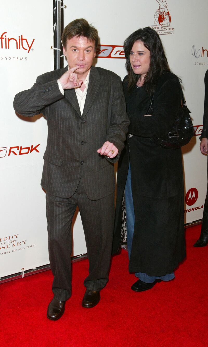 NEW YORK - AUGUST 29: Actor Mike Myers and his wife arrives arrive at Sean P. Diddy Combs and Guy Oseary's "The Greatest Party Of All Time" presented by RBK at Cipriani August 29, 2002 in New York City, New York. (Photo by Matthew Peyton/Getty Images)