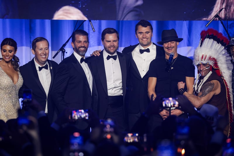 WASHINGTON, DC - JANUARY 19: (L-R) Alina Habba, Senior Advisor to President Donald J. Trump, Sergio Gor, Donald Trump Jr., U.S. Vice President-elect JD Vance, Charlie Kirk, and Kid Rock on stage with The Village People during the Turning Point USA Inaugural-Eve Ball at the Salamander Hotel on January 19, 2025 in Washington, DC. Donald Trump will be sworn in as the 47th U.S. president on January 20. (Photo by Samuel Corum/Getty Images)