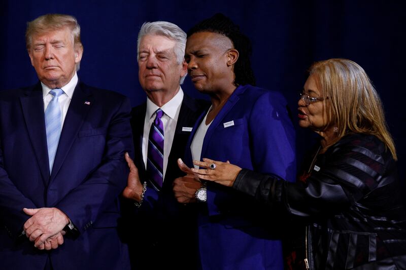 Michael Tait (second from right) prays over President Donald Trump with other faith leaders during a "Evangelicals for Trump" campaign in 2020.