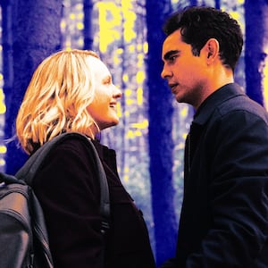 A photo illustration of Elisabeth Moss and Max Minghella in Handmaid's Tale.