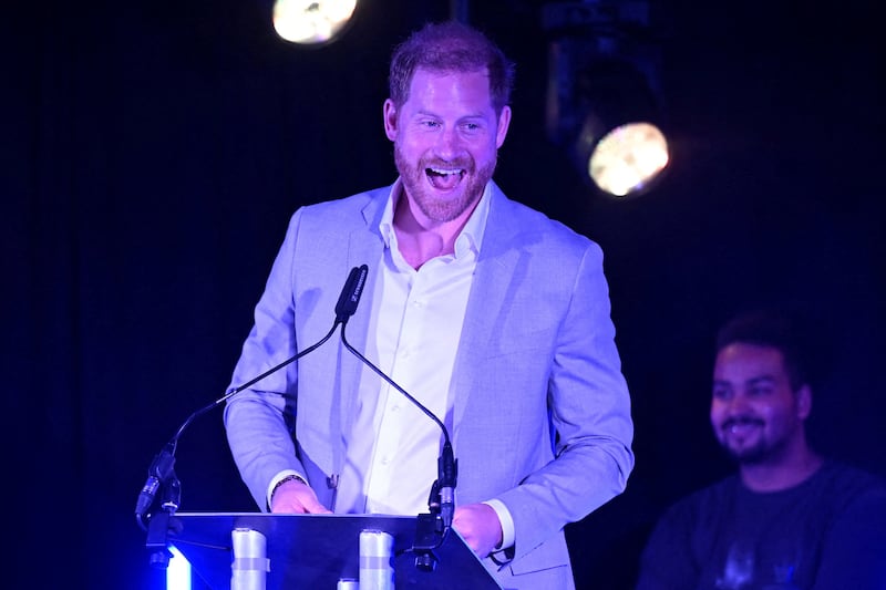Prince Harry posed for photographers at an awards ceremony in London.