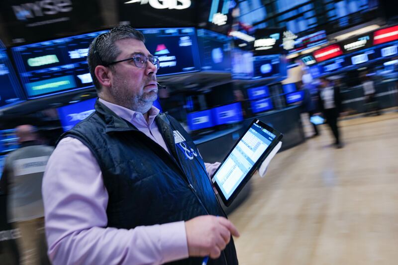 NEW YORK, NEW YORK - MARCH 07: Traders work on the floor of the New York Stock Exchange (NYSE) on March 07, 2025 in New York City. The Dow was mixed in morning trading as confusion over the Trump administration's tariff policy continued to spook investors and global markets. (Photo by Spencer Platt/Getty Images)