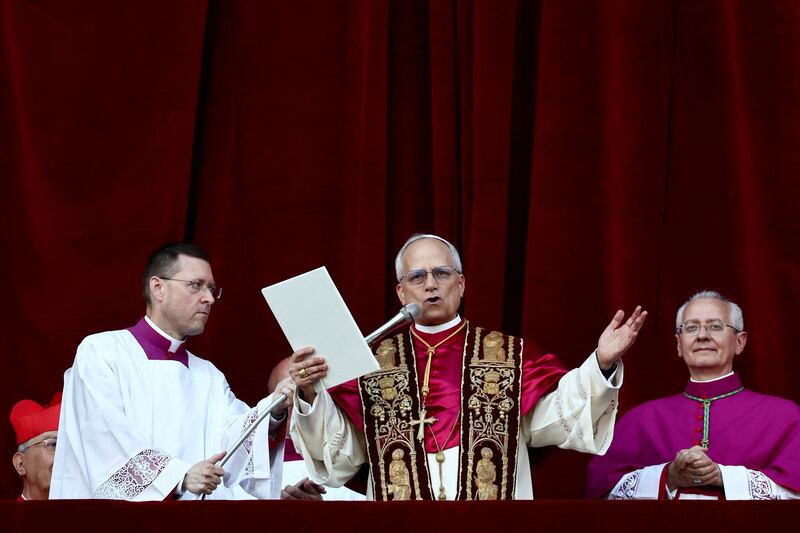 Newly elected Pope Leo XIV, Cardinal Robert Prevost of the United States, delivers the "Urbi et Orbi" (to the city and to the world) message from the balcony of St. Peter's Basilica.
