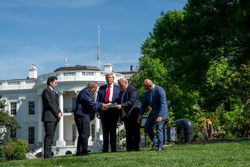 Trump said the addition of two flag poles was long overdue at the White House, where the flag flies from the roof 24/7.