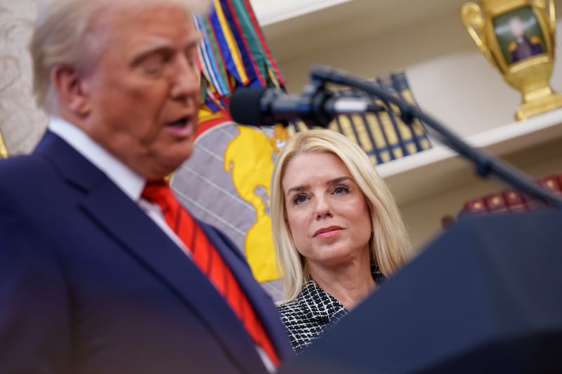 President Donald Trump, accompanied by Pam Bondi (C), speaks before Bondi is sworn in as U.S. Attorney General in the Oval Office at the White House on February 05, 2025 in Washington, DC.