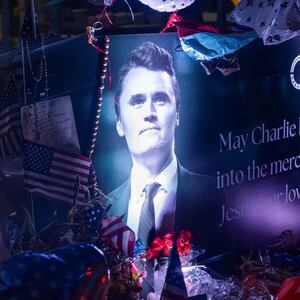 A poster of conservative activist Charlie Kirk is displayed at a memorial following the fatal shooting of Kirk, at the Turning Point USA headquarters in Phoenix, Arizona, U.S., September 12, 2025. REUTERS/Thomas Machowicz