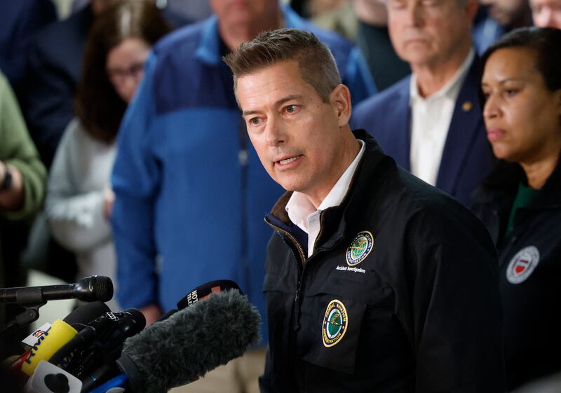US secretary of transportation, Sean Duffy speaks at a media briefing at Reagan National Airport after a plane crashed into the Potomac River outside Washington, DC, January 30, 2025. A regional jet from Kansas crashed into Washington's Potomac River after colliding mid-air with a military helicopter near Reagan National Airport, officials said January 29, prompting a major emergency response and grounding all flights. (Photo by Ting Shen / AFP) (Photo by TING SHEN/AFP via Getty Images)