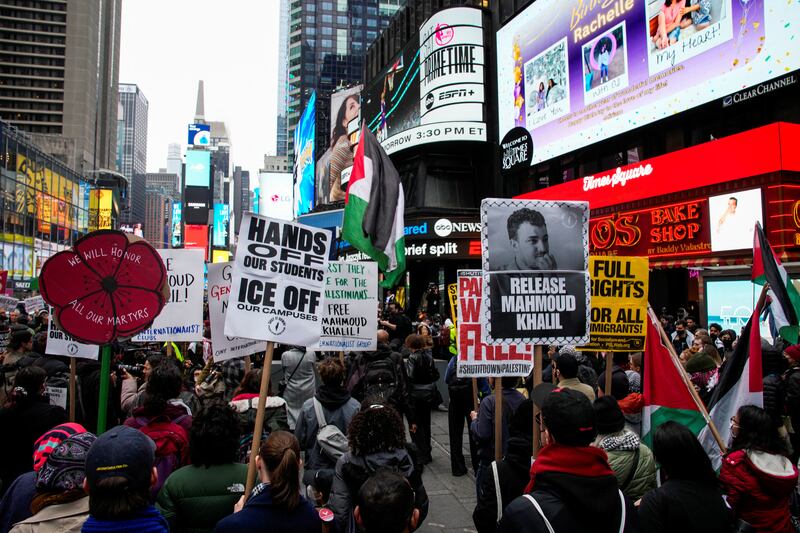Protestors rally in Times Square and call for the release of Mahmoud Khalil.