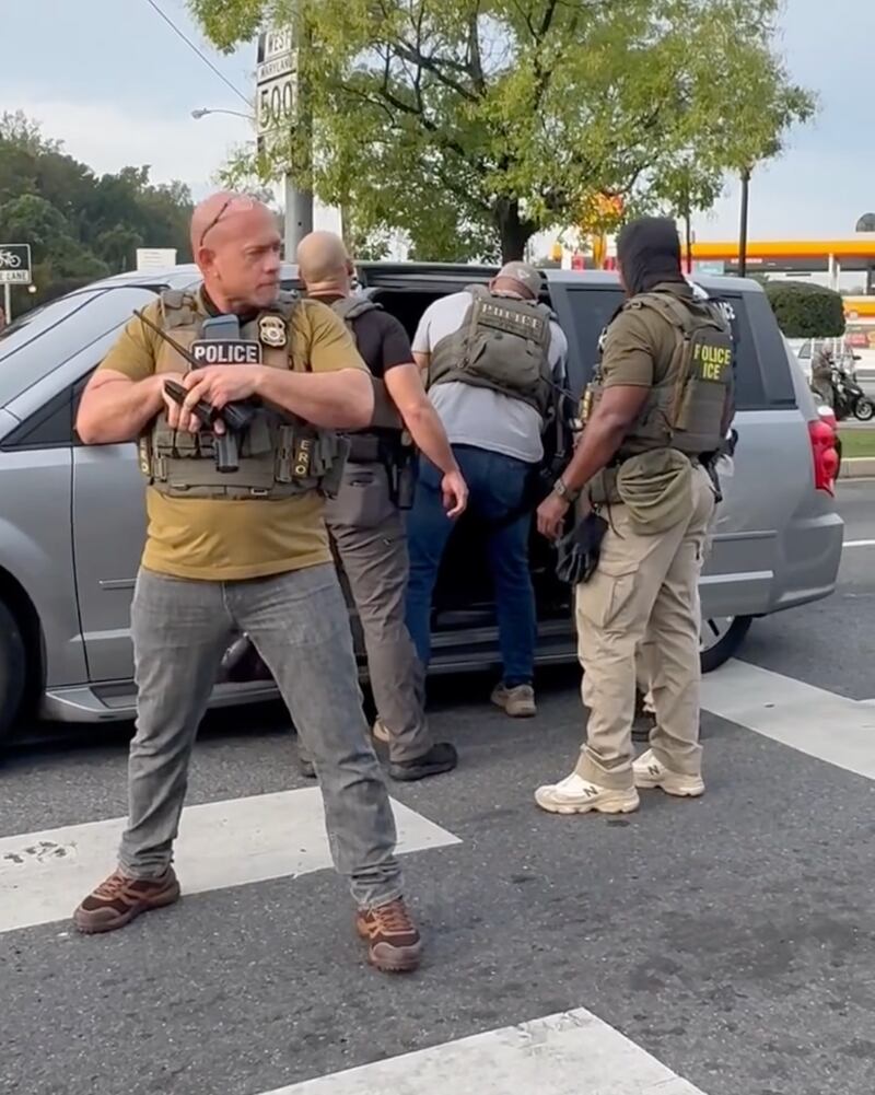 The man who resisted arrest was eventually handcuffed and placed in the back of an unmarked minivan.