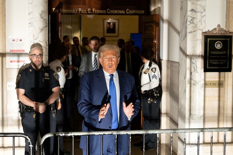 Photograph of Donald Trump speaking outside of a New York courthouse