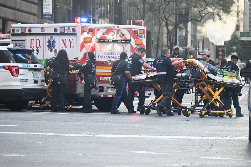 MANHATTAN, NEW YORK, UNITED STATES - JULY 28: Multiple NYPD police units arrive to the scene after a police officer and a civilian were shot by a suspect armed with an assault rifle in New York City, United States on July 28, 2025. (Photo by Kyle Mazza/Anadolu via Getty Images)