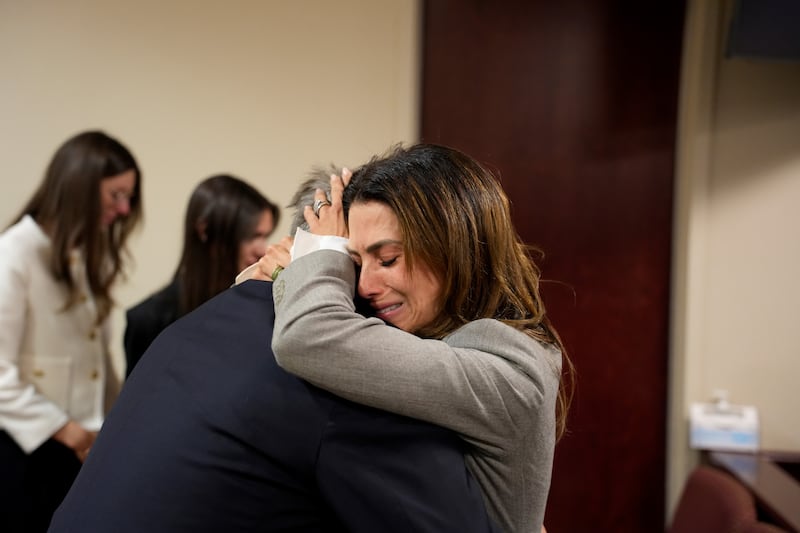 Alec Baldwin and his wife Hilaria Baldwin embrace during his trial for involuntary manslaughter in First Judicial District Court on July 12, 2024 in Santa Fe, New Mexico.