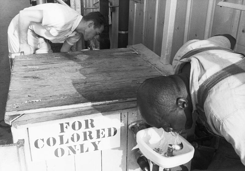 An undated photograph of a segregated drinking fountain in the American South.