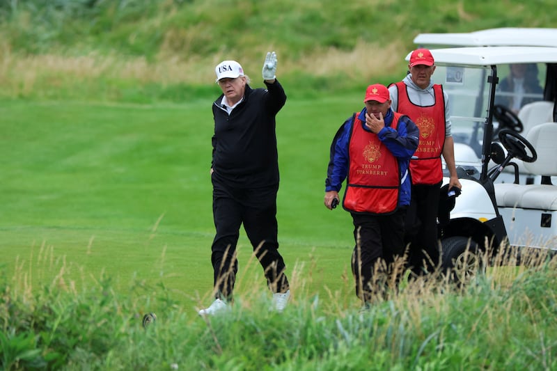 U.S. President Donald Trump holds a golf ball at Trump Turnberry resort in Turnberry, Scotland, Britain, July 27, 2025. REUTERS/Phil Noble