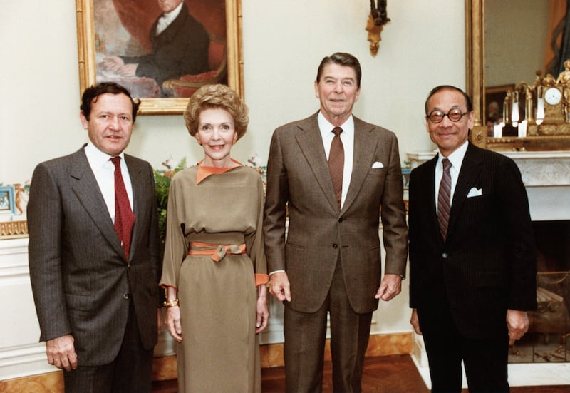 President and Mrs. Ronald Reagan extend their warm congratulations to I. M. Pei (right), 1983 Laureate of the Pritzker Architecture Prize. Jay A. Pritzker (left), President of the Hyatt Foundation, which funds and administers the prize, made the presentation of $100,000 tax-free honorarium at the Metropolitan Museum of Art in New York, yesterday.