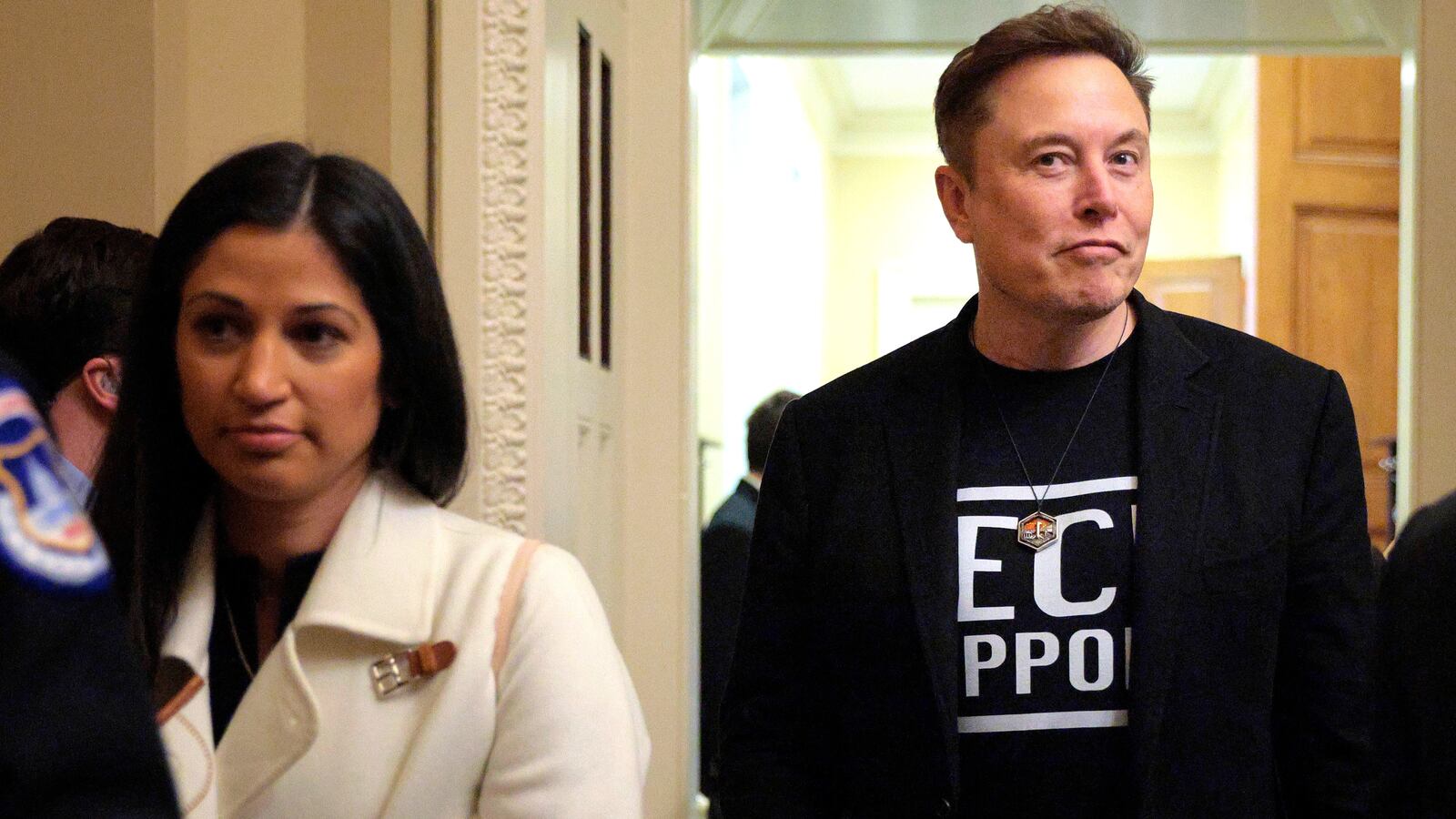 Elon Musk accompanied by DOGE adviser Katie Miller (left) leave a meeting with Senate Republicans on March 05, 2025.
