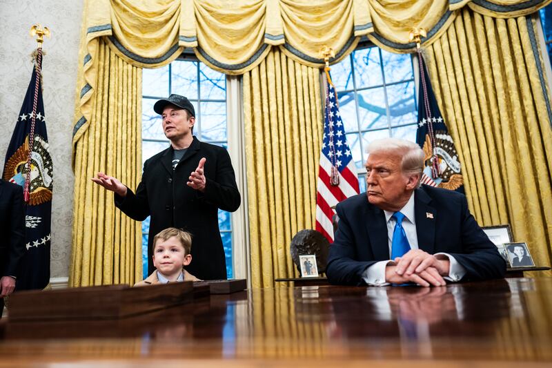 Washington, DC - February 11 : Elon Musk, with his son X Æ A-Xii, speaks with President Donald J Trump and reporters in the Oval Office at the White House on Tuesday, Feb 11, 2025 in Washington, DC. (Photo by Jabin Botsford/The Washington Post via Getty Images)