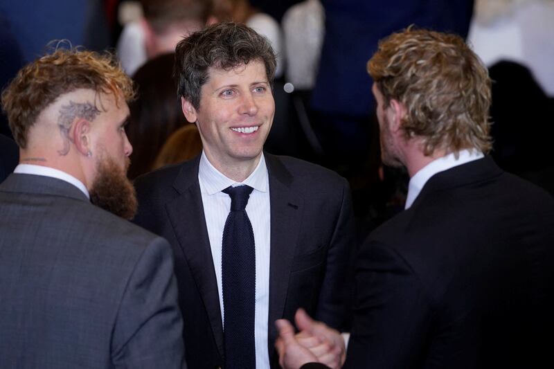 Sam Altman, chief executive officer of OpenAI Inc., center, with boxer Jake Paul and wrestler Logan Paul during the 60th presidential inauguration in Emancipation Hall of the US Capitol in Washington, DC, US, on Monday, Jan. 20, 2025. Donald Trump's Monday swearing-in marks just the second time in US history that a president lost the office and managed to return to power - a comeback cementing his place within the Republican Party as an enduring, transformational figure rather than a one-term aberration. Al Drago/Pool via REUTERS