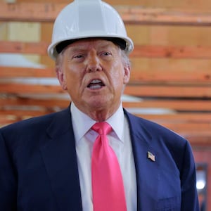 WASHINGTON, DC - JULY 24: U.S. President Donald Trump and Federal Reserve Chair Jerome Powell talk to reporters while touring the Federal Reserve’s $2.5 billion headquarters renovation project on July 24, 2025 in Washington, DC. Trump has been critical of the cost of the renovation, blaming Fed Chair Jerome Powell, whom he has called a "numbskull,” for the cost. Trump has recently threatened to oust Powell because, according to the president, the bank has not lowered interest rates fast enough. (Photo by Chip Somodevilla/Getty Images)