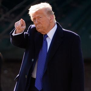 President Trump walks across the White House South Lawn to board Marine One.