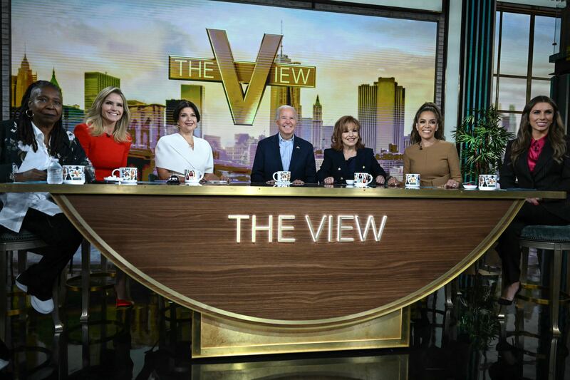 US President Joe Biden (C) attends a live interview on ABC's "The View" in New York on September 25, 2024. The hosts (L-R) are Whoopi Goldberg, Sara Haines, Ana Navarro, Joy Behar, Sunny Hostin, and Alyssa Farah Griffin.