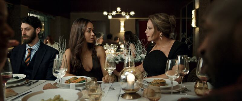 Zoe Saldaña as Rita Moro Castro and Karla Sofía Gascón as Emilia Pérez
