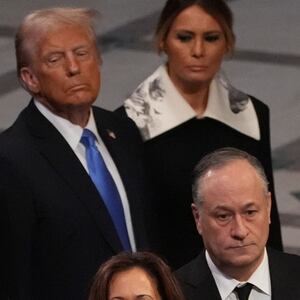 WASHINGTON, DC - JANUARY 9: Former President Bill Clinton, former Secretary of State Hillary Clinton, former President George W. Bush, former First Lady Laura Bush, former President Barack Obama, President-elect Donald Trump and his wife Melania Trump, President Joe Biden, First Lady Jill Biden, Vice President Kamala Harris and Second Gentleman Doug Emhoff watch as the casket of former President Jimmy Carter is carried away during state funeral services at the National Cathedral at the National Cathedral on January 9, 2025 in Washington, D.C. (Photo by Demetrius Freeman/The Washington Post via Getty Images)