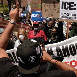People attend a rally in downtown Los Angeles, California, U.S. June 9, 2025.