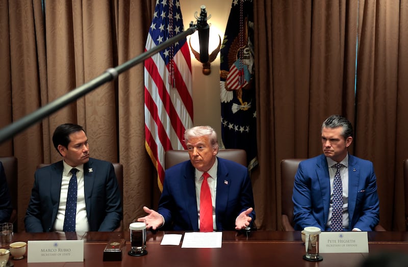 U.S. President Donald Trump (C) delivers remarks alongside Secretary of State Marco Rubio (L) and Secretary of Defense Pete Hegseth during a Cabinet meeting at the White House on April 10, 2025 in Washington, DC.