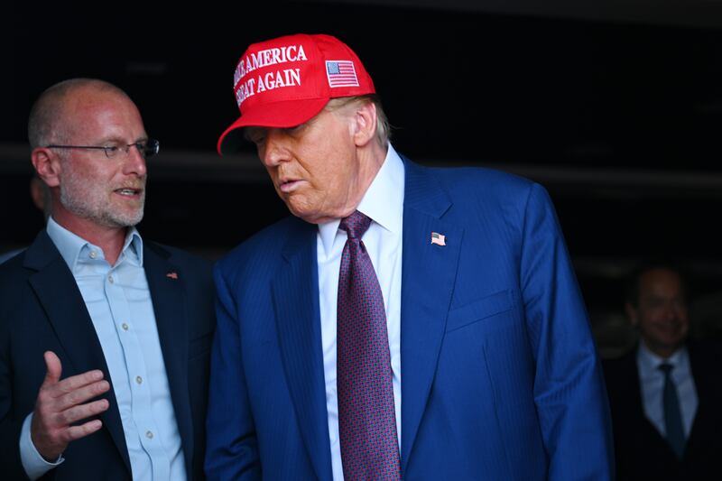 Brendan Carr and Donald Trump.