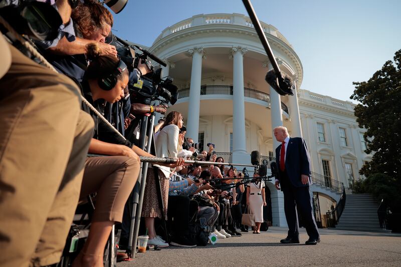 President Donald Trump talks to reporters as he departs the White House on July 25, 2025 in Washington, D.C.