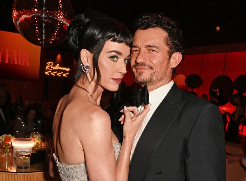 Katy Perry (L) and Orlando Bloom (R)