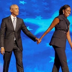 DNC CHICAGO, IL AUGUST 20, 2024 Former President Barack Obama and former first lady Michelle Obama on stage during the Democratic National Convention Tuesday, Aug. 20, 2024, in Chicago. (Robert Gauthier/Los Angeles Times via Getty Images)