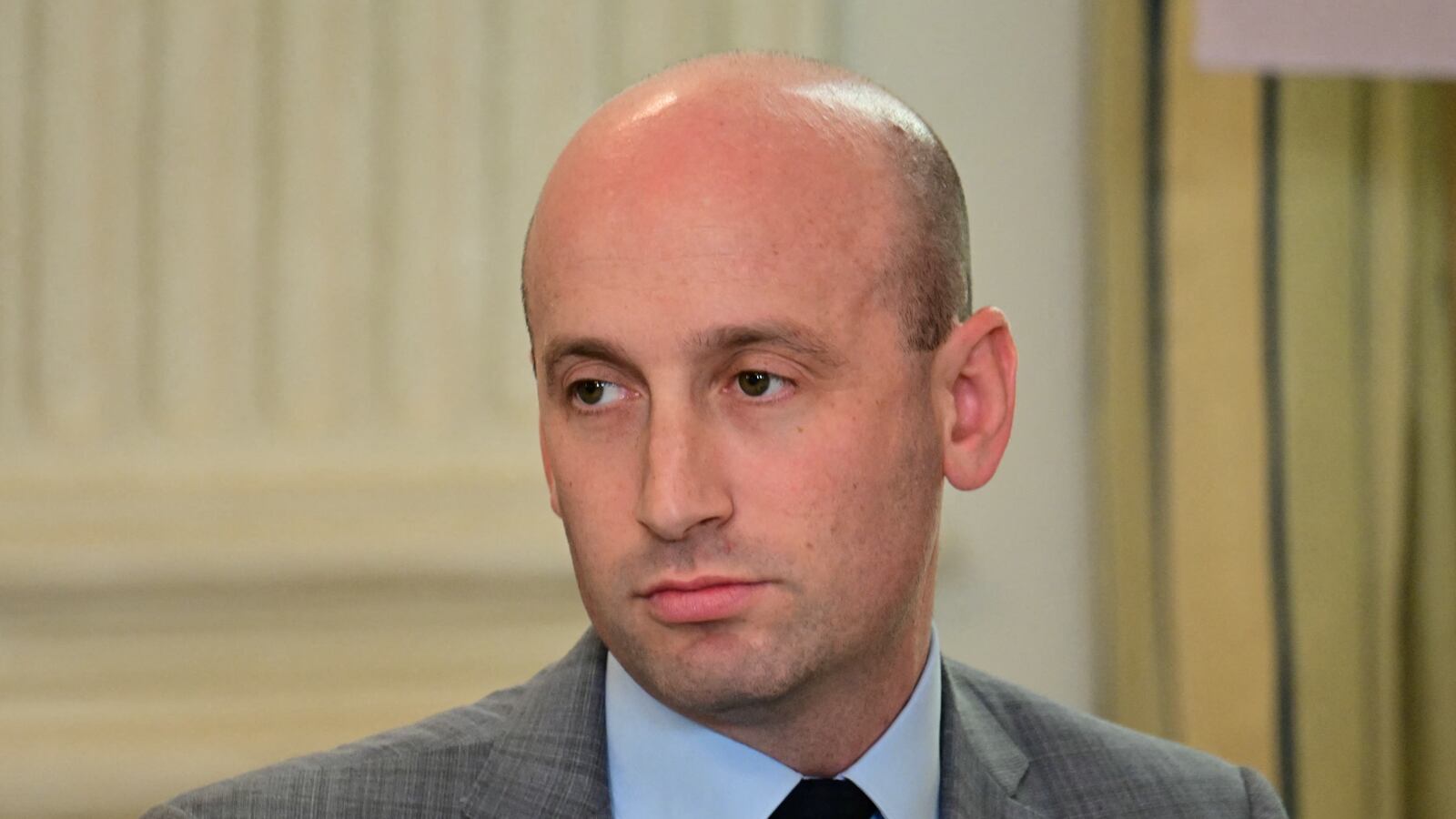 White House deputy chief of staff Stephen Miller looks on during a law enforcement roundtable in the State Dining Room of the White House