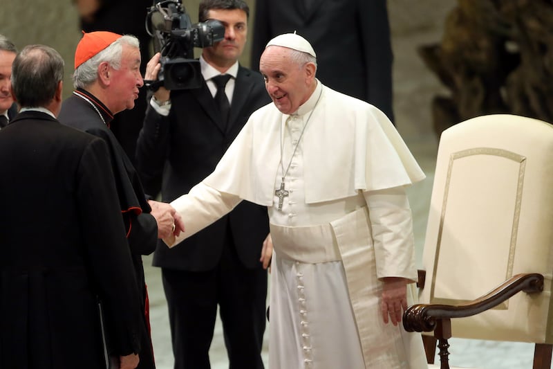 Pope Francis, who died on April 21 at age 88, was a critic of President Donald Trump's anti-immigration rhetoric. He is pictured here greeting Nichols.