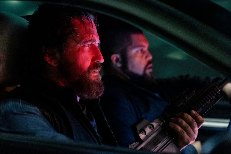 Gerard Butler as 'Big Nick' O'Brien and O’Shea Jackson Jr. as Donnie Wilson in Den of Thieves 2: Panthera.