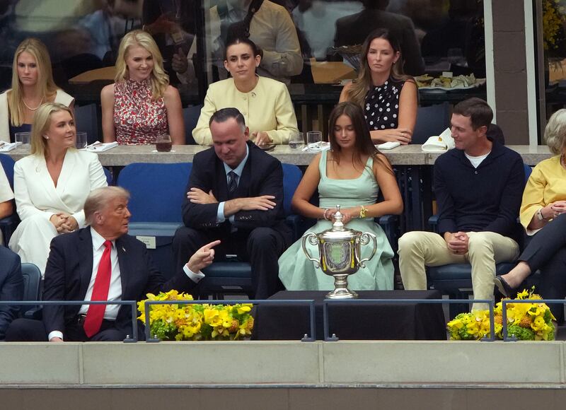 U.S. President Donald Trump (L) points to his son-in-law Jared Kushner (R) during the U.S. Open men's singles final at the Billie Jean King National Tennis Center for the U.S. Open finals on September 7, 2025 in New York City.