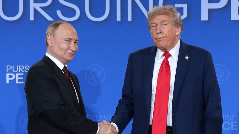 President Donald Trump and Russian President Vladimir Putin shake hands at the end of a press conference at Joint Base Elmendorf-Richardson on August 15, 2025 in Anchorage, Alaska where they did not take any questions and did not reveal anything had been achieved at their meeting besides a promise for more talks.