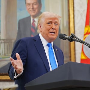 WASHINGTON, DC - MARCH 28: U.S. President Donald Trump announces that his administration has reached a deal with elite law firm Skadden, Arps, Slate, Meagher & Flom during a swearing-in ceremony in the Oval Office at the White House on March 28, 2025 in Washington, DC. Trump hosted the swearing in of his former personal attorney and White House Presidential counselor Alina Habba as interim U.S. Attorney in New Jersey. (Photo by Andrew Harnik/Getty Images)