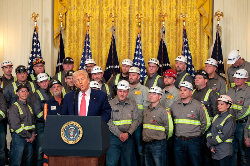President Donald Trump speaks alongside coal and energy workers during an executive order signing ceremony at the White House on April 8, 2025 in Washington, D.C.