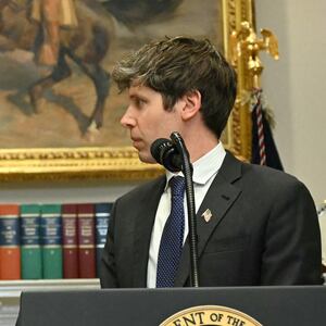 US President Trump gestures as CEO of Open AI Sam Altman speaks in the Roosevelt Room at the White House.