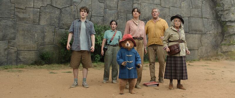 Samuel Joslin, Madeleine Harris, Paddington, Emily Mortimer, Hugh Bonneville, and Julie Walters in  'Paddington In Peru'.