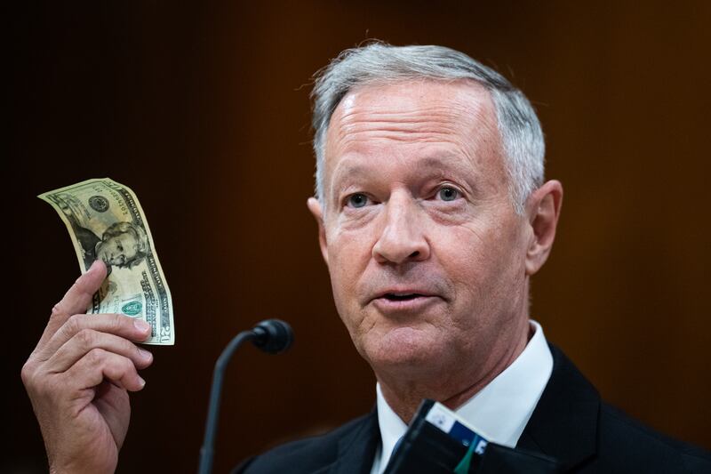 UNITED STATES - SEPTEMBER 11: Martin O'Malley, commissioner of the Social Security Administration, holds a $20 bill during the Senate Budget Committee hearing titled "Social Security Forever: Delivering Benefits and Protecting Retirement Security," in Dirksen building on Wednesday, September 11, 2024.