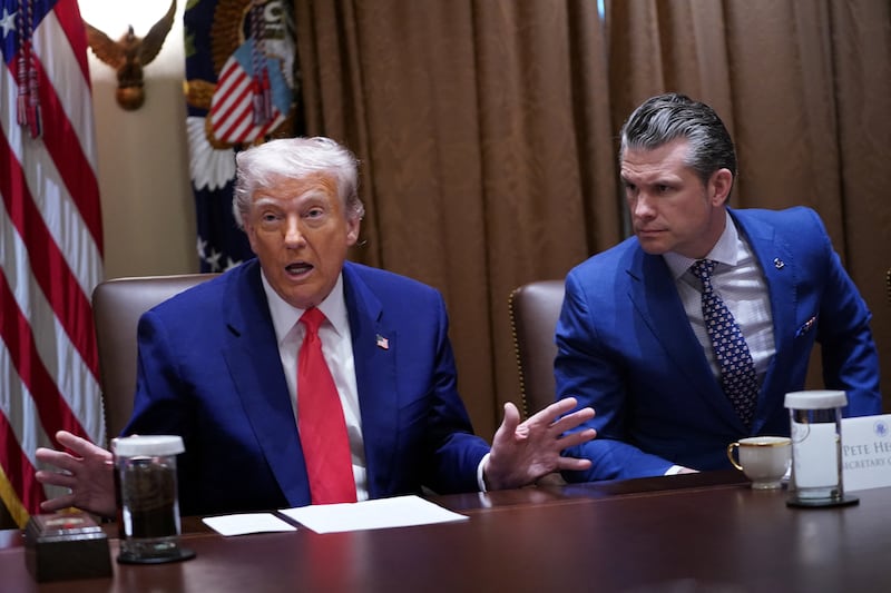 President Donald Trump and Secretary of Defense Pete Hegseth attend a cabinet meeting at the White House in Washington, D.C. on April 10, 2025.