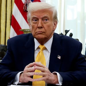 U.S. President Donald Trump sits in the Oval Office of the White House in Washington, D.C., U.S., March 7, 2025.