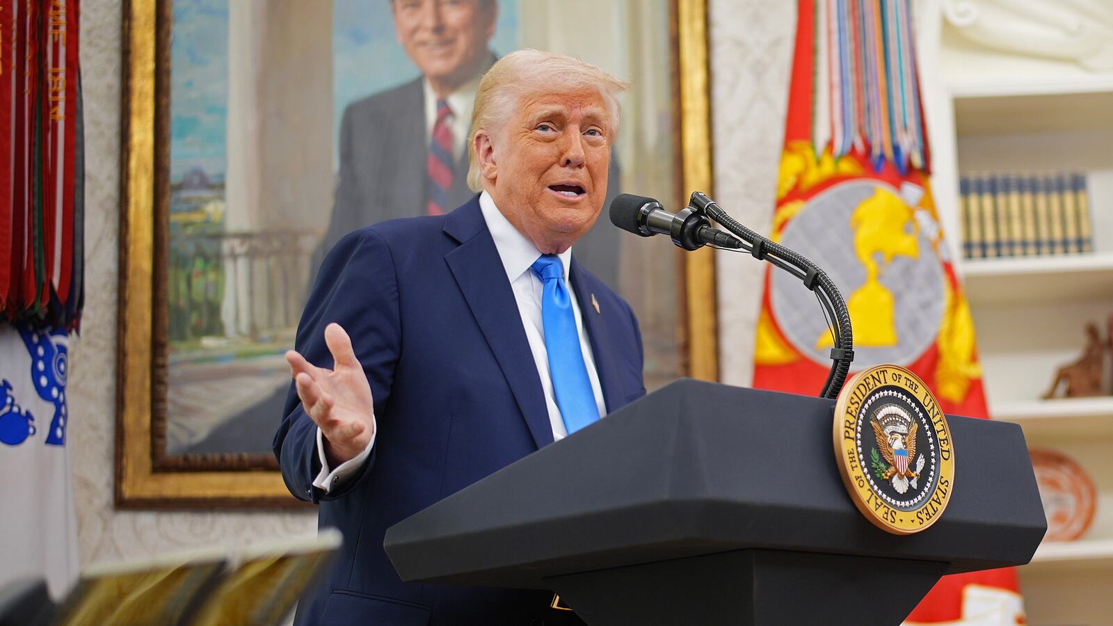 WASHINGTON, DC - MARCH 28: U.S. President Donald Trump announces that his administration has reached a deal with elite law firm Skadden, Arps, Slate, Meagher & Flom during a swearing-in ceremony in the Oval Office at the White House on March 28, 2025 in Washington, DC. Trump hosted the swearing in of his former personal attorney and White House Presidential counselor Alina Habba as interim U.S. Attorney in New Jersey. (Photo by Andrew Harnik/Getty Images)