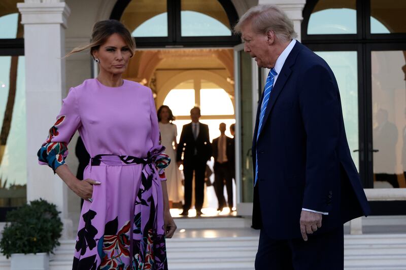 PALM BEACH, FLORIDA - APRIL 06: Republican presidential candidate, former US President Donald Trump and former first lady Melania Trump arrive at the home of billionaire investor John Paulson on April 6, 2024 in Palm Beach, Florida. Donald Trump's campaign is expecting to raise more than 40 million dollars when major donors gather a fundraiser billed as the "Inaugural Leadership Dinner". (Photo by Alon Skuy/Getty Images)