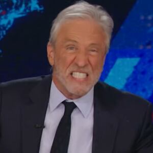 Jon Stewart breaking the coffee mug
