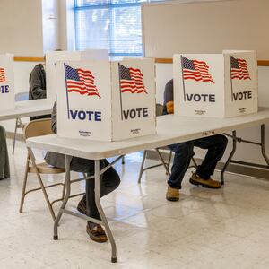 Voters fill out their ballots.