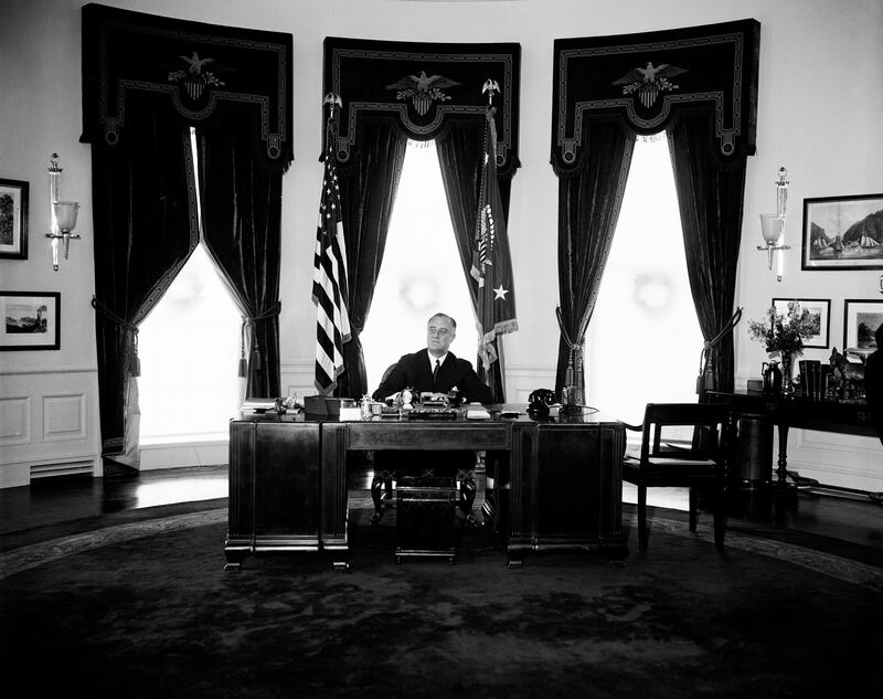 U.S. President Franklin Roosevelt at his Desk Oval Office White House Washington DC USA Harris & Ewing December 31 1934. (Photo by: History Archive/Universal Images Group via Getty Images)